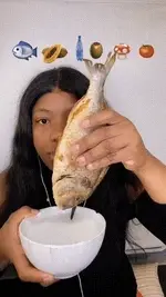 girl-eating-fish-fish.webp